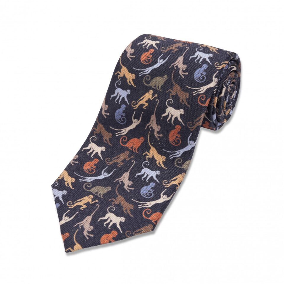 (product) Navy with Tan & White Monkeys Silk Necktie, Rolled