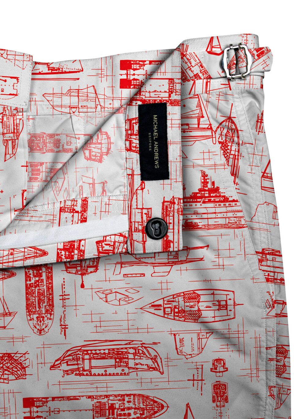 (product) White Swim Shorts with Red Boats, close-up view highlighting lining and side-tab detail