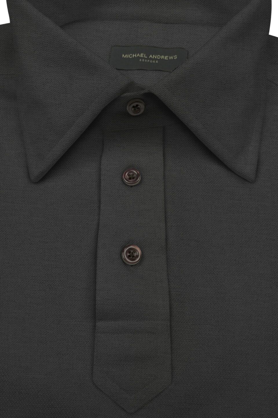 (product) Charcoal Pique Short Sleeve Polo Shirt, showcasing collar and button details