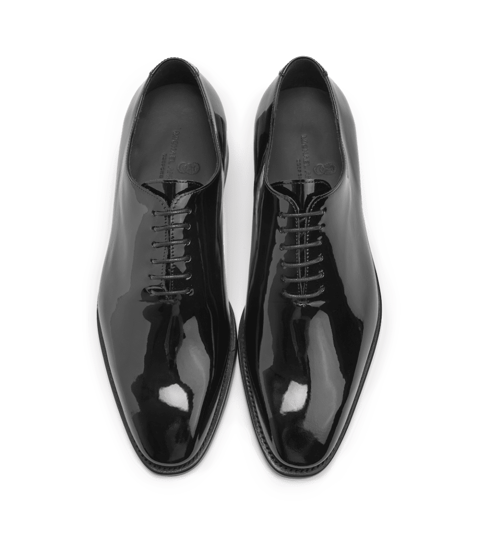 (product) Black Patent Leather Whole Cut Lace-Up, Top view of the pair